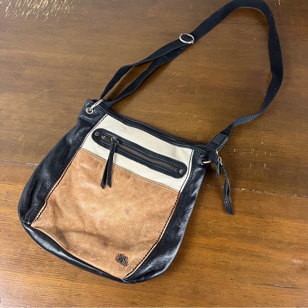 The Sak leather trI colored purse